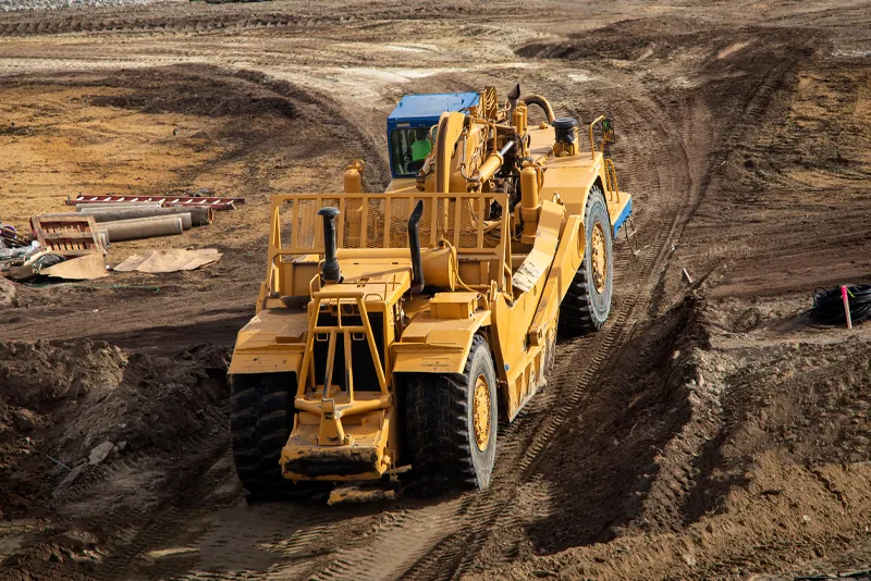 BNV Earthmovers Scraper for Earthmoving and Excavation on Michigan Construction Site